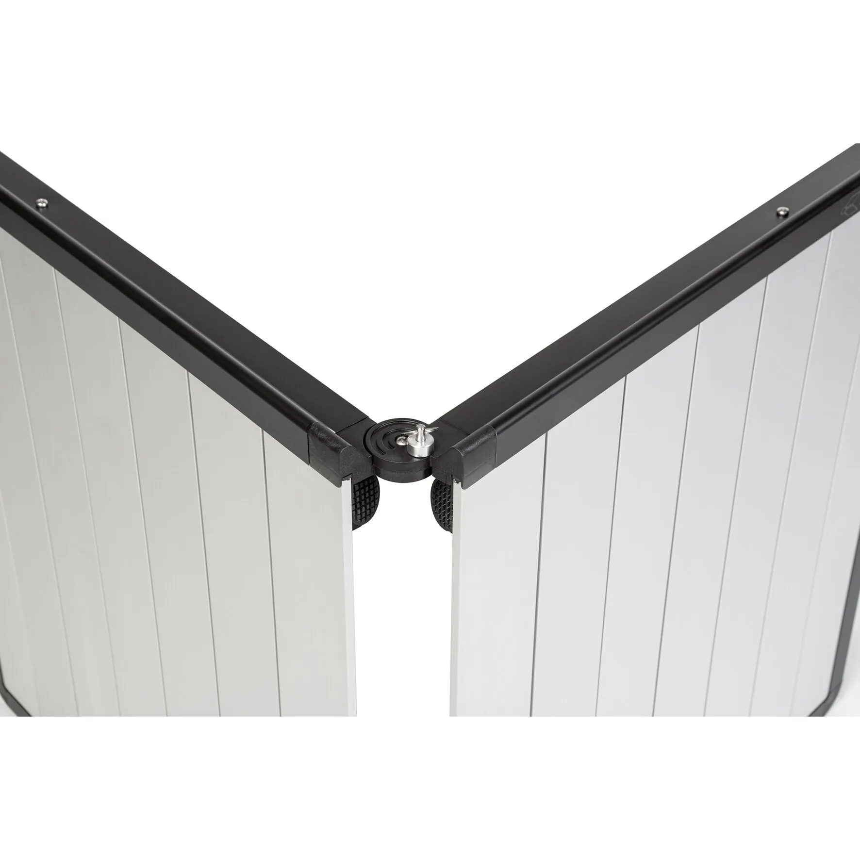 Detailaufnahme des Klapptischs Dinemic mit 126 cm langer weißer Tischplatte, schwarzem Rahmen und zentralem Klappmechanismus