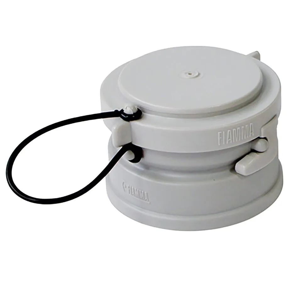 Adapter Quick Connection W von Fiamma, weißer runder Kunststoffadapter mit schwarzer Halteschlaufe und seitlichen Verschlüssen