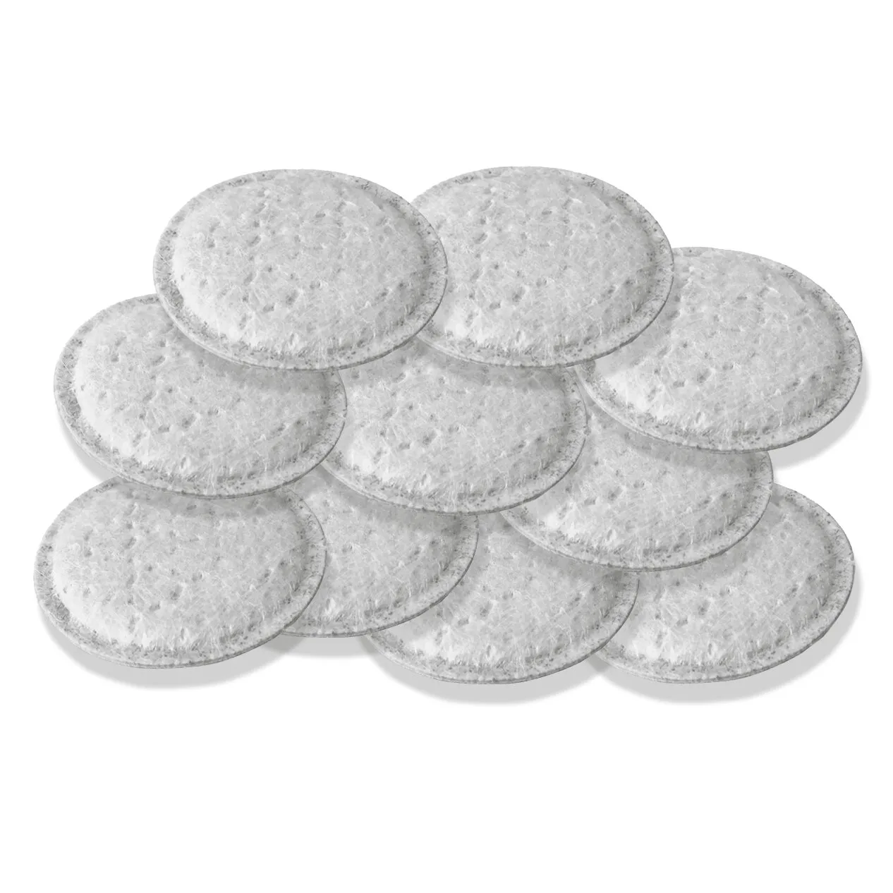 Zehn runde, weiße Filterpads aus Vliesstoff für Gasfilter, übereinandergelegt auf weißem Hintergrund