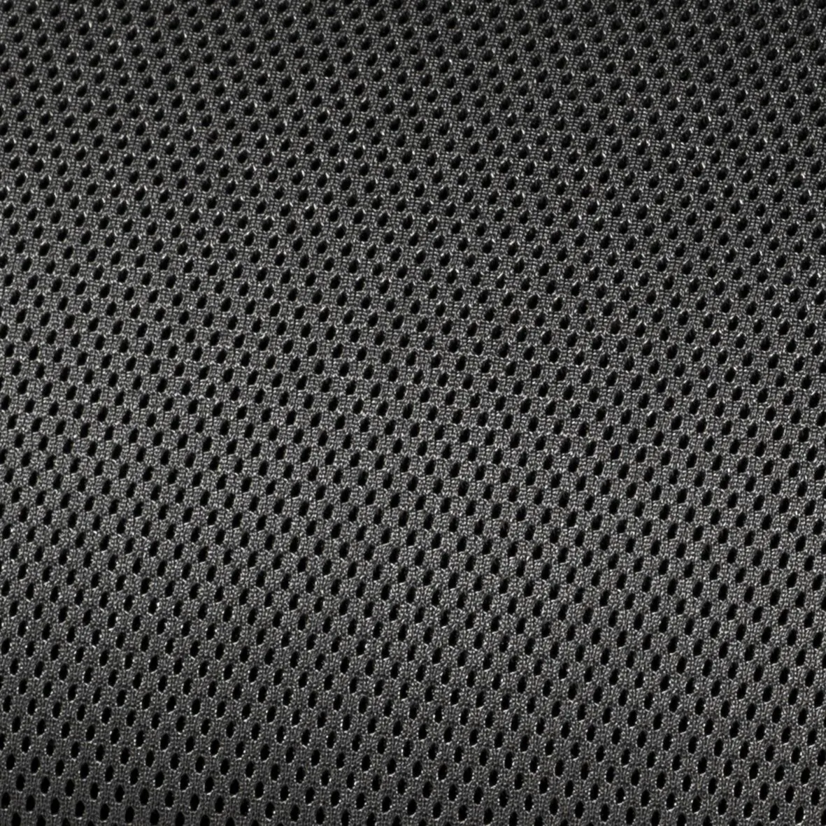 Detailaufnahme der anthrazitfarbenen, feinmaschig perforierten Oberfläche der Fußauflage HighQ Exclusive