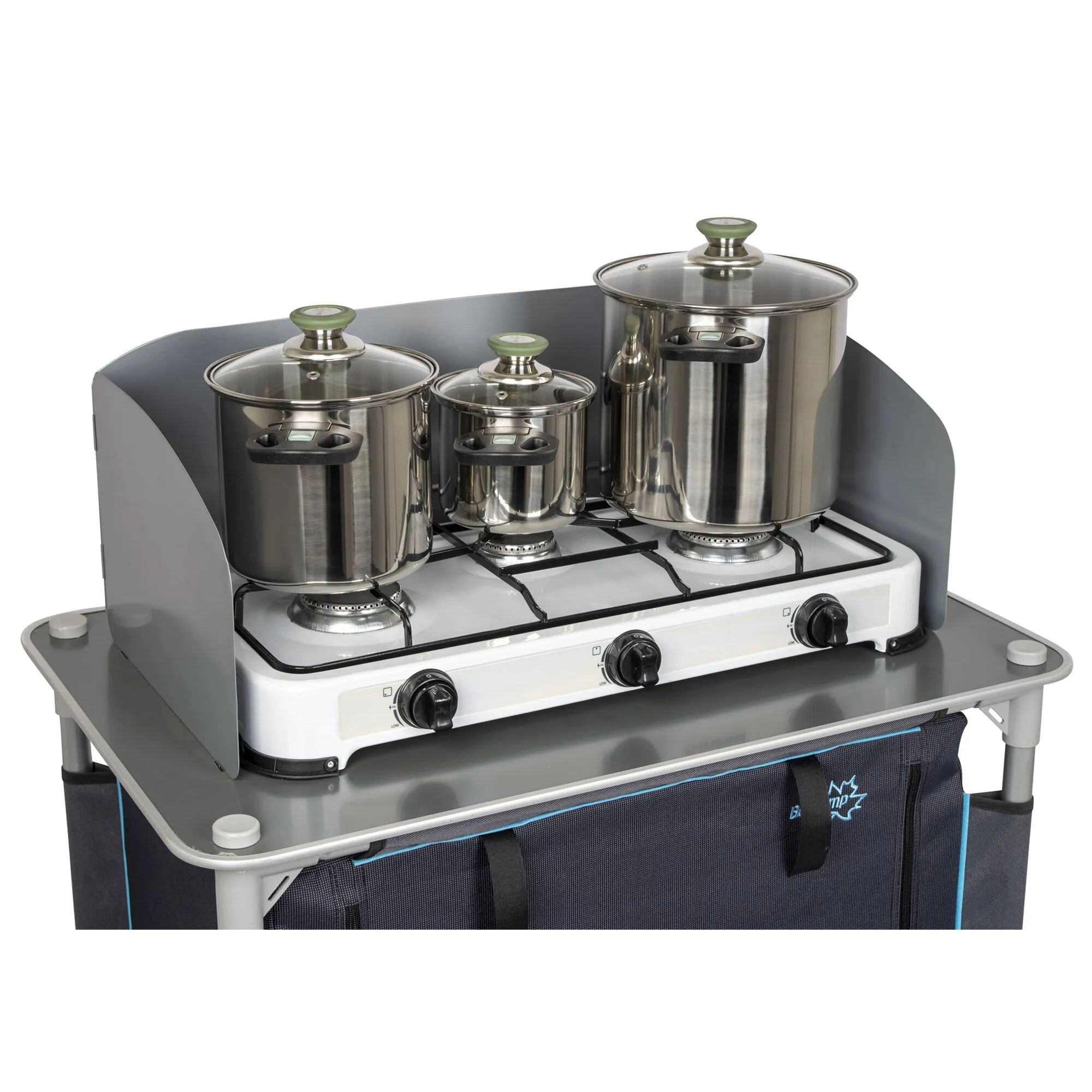 Kochtopfset Elegance Compact aus Edelstahl mit drei Töpfen, Glasdeckeln und grünen Deckelgriffen auf einem Gaskocher