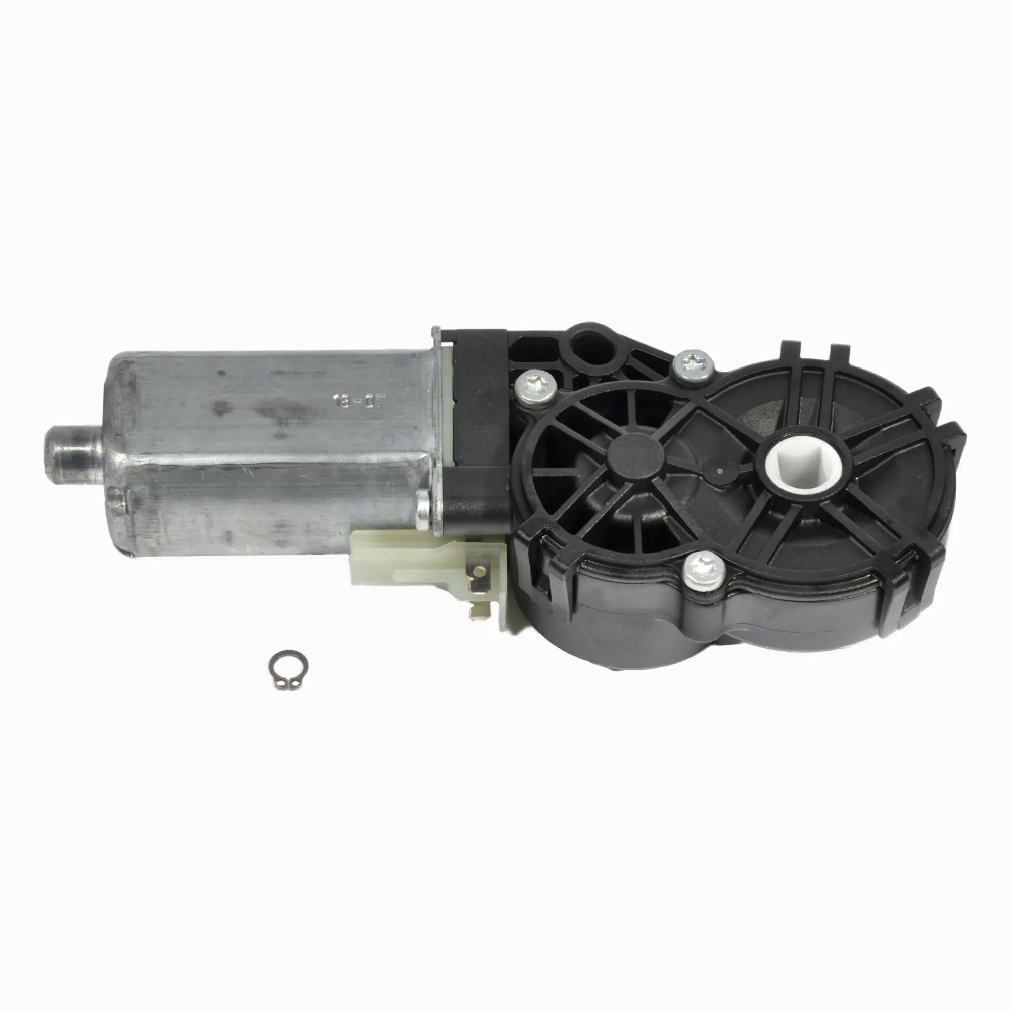 Motor Thule Slide-Out Step V12/V16 mit silbernem Metallgehäuse, schwarzem Kunststoffgetriebe und weißer Kunststoffaufnahme, inklusive Sicherungsring